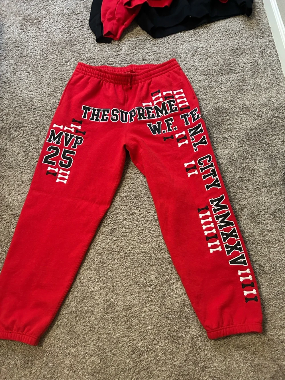 Supreme Red Kids Joggers with Bold White & Black Graphics